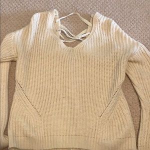 Fall creme sweater with unique lace back